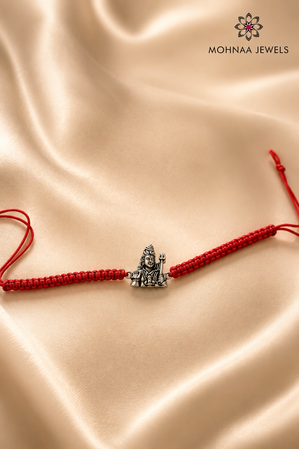 Rudra Mahadev 925 Sterling Silver Rakhi featuring detailed Lord Shiva motif on handcrafted red thread by Mohnaa Jewels