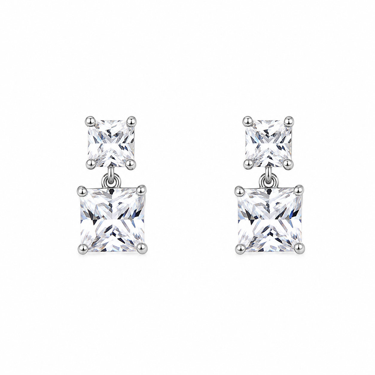 925 sterling silver drop earrings with double princess-cut cubic zirconia stones and rhodium finish.